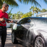 A controlled wash in morning shade helps keep a Florida Keys vehicle cooler while DI water, foam-cannon soap, and proper hand-wash media remove salt and surface film.